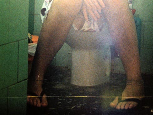 Woman is sitting on a toilet Paula Rey Wikipedia