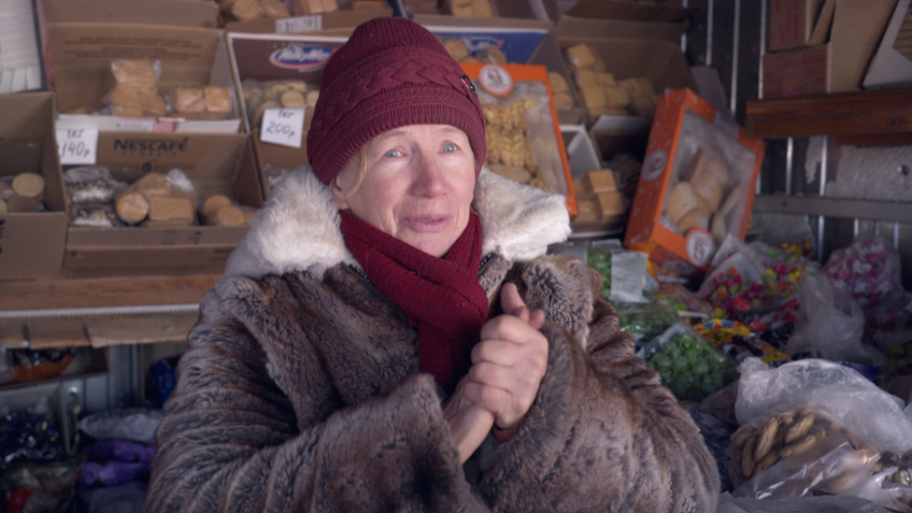 128540810 raisamarketstallsaleswoman3