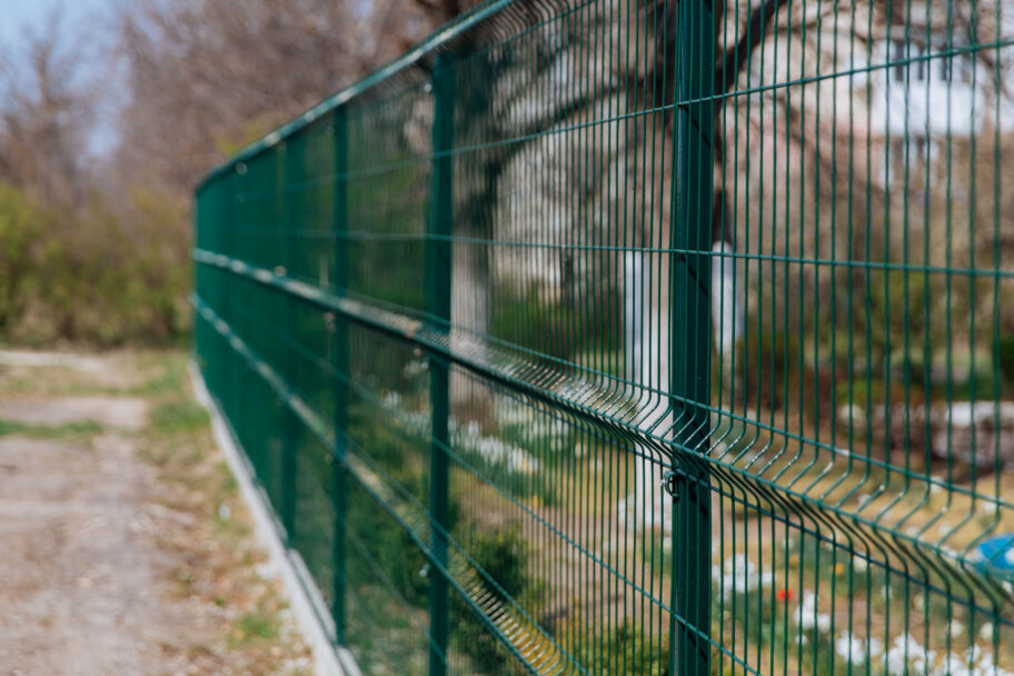 steel grill green fence with wire fencing